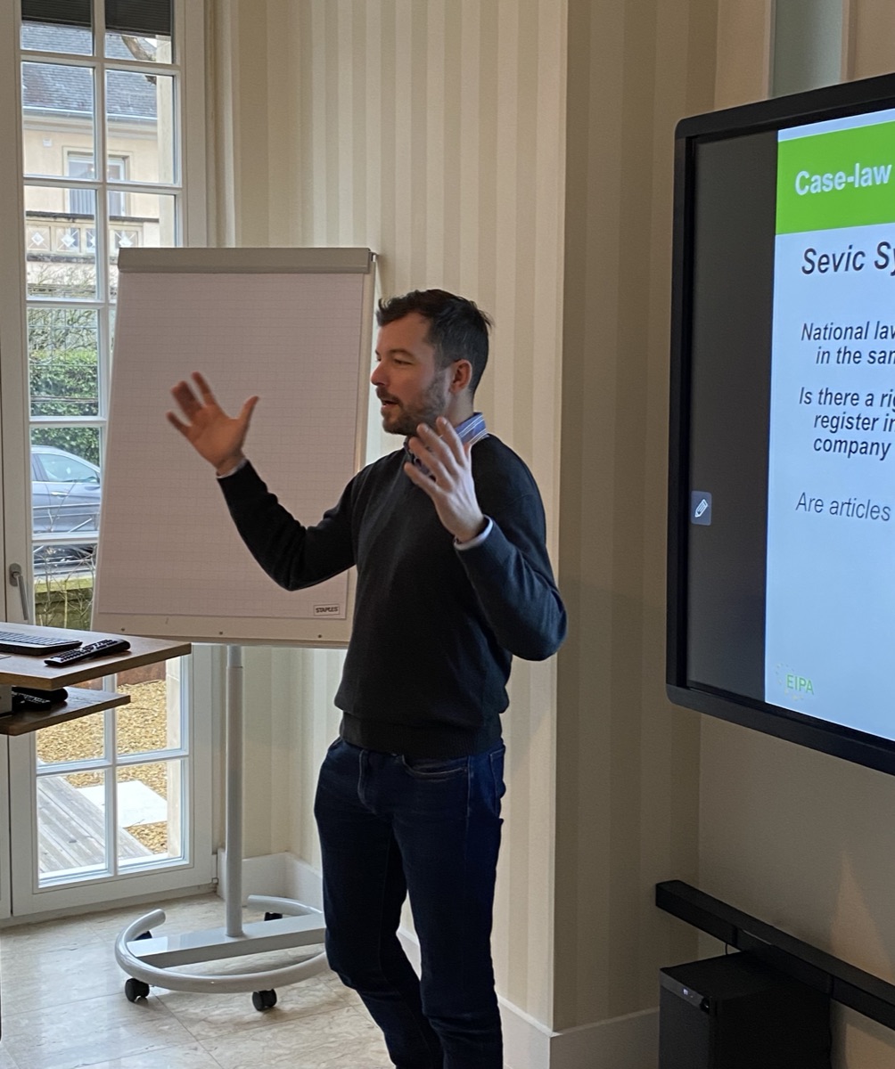 Tomasz Kramer delivering a hands-on AI training session
